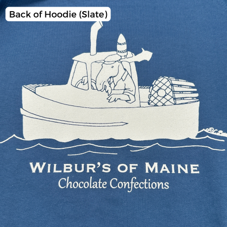 A hoodie in slate blue with a moose driving a lobster boat. The text reads " Wilbur's of Maine Chocolate Confections"